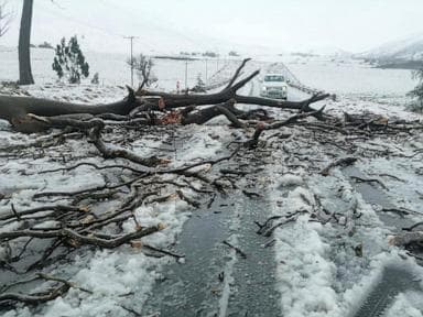 Image for  At least 7 killed, schoolchildren swept away as floods and snow hit South Africa