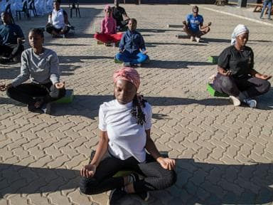 Image for  Yoga in a Zimbabwe tavern is the latest mental health outreach in a struggling country