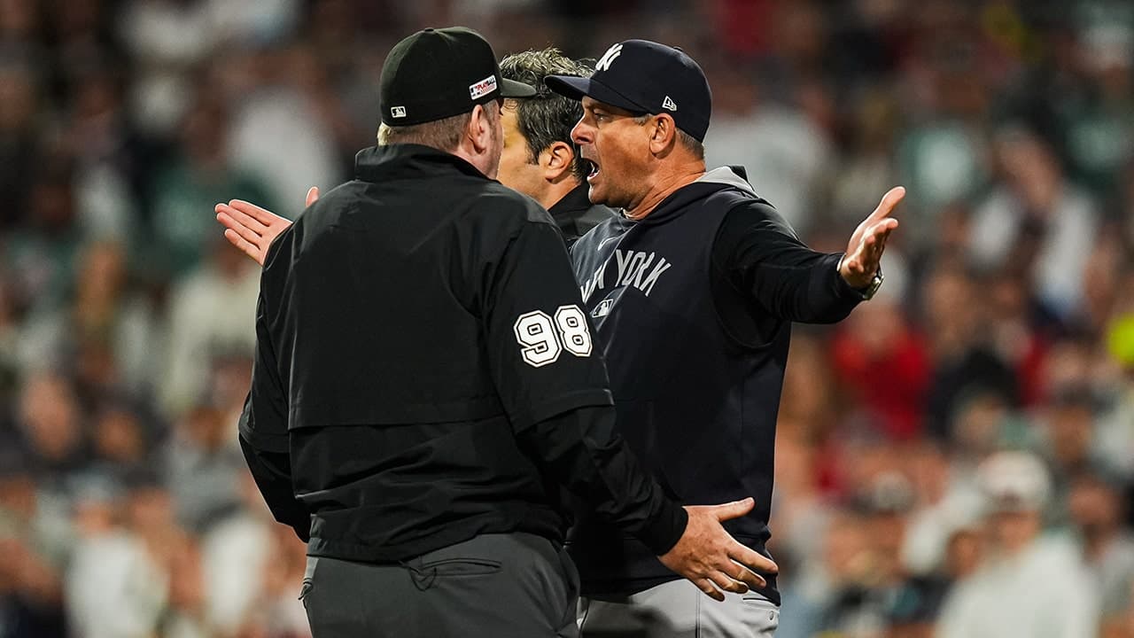 Image for Yankees' Aaron Boone, DJ LeMahieu ejected over controversial foul ball in extra-innings loss to Red Sox