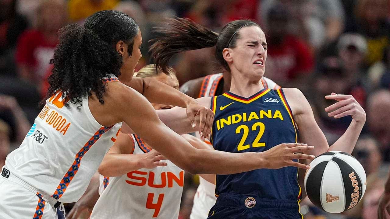 Image for Caitlin Clark gets poked in eye, shoved to ground in skirmish with Sun players