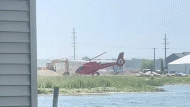 Image for Heart-stopping video shows helicopter flip and crash near Michigan waterfront restaurant