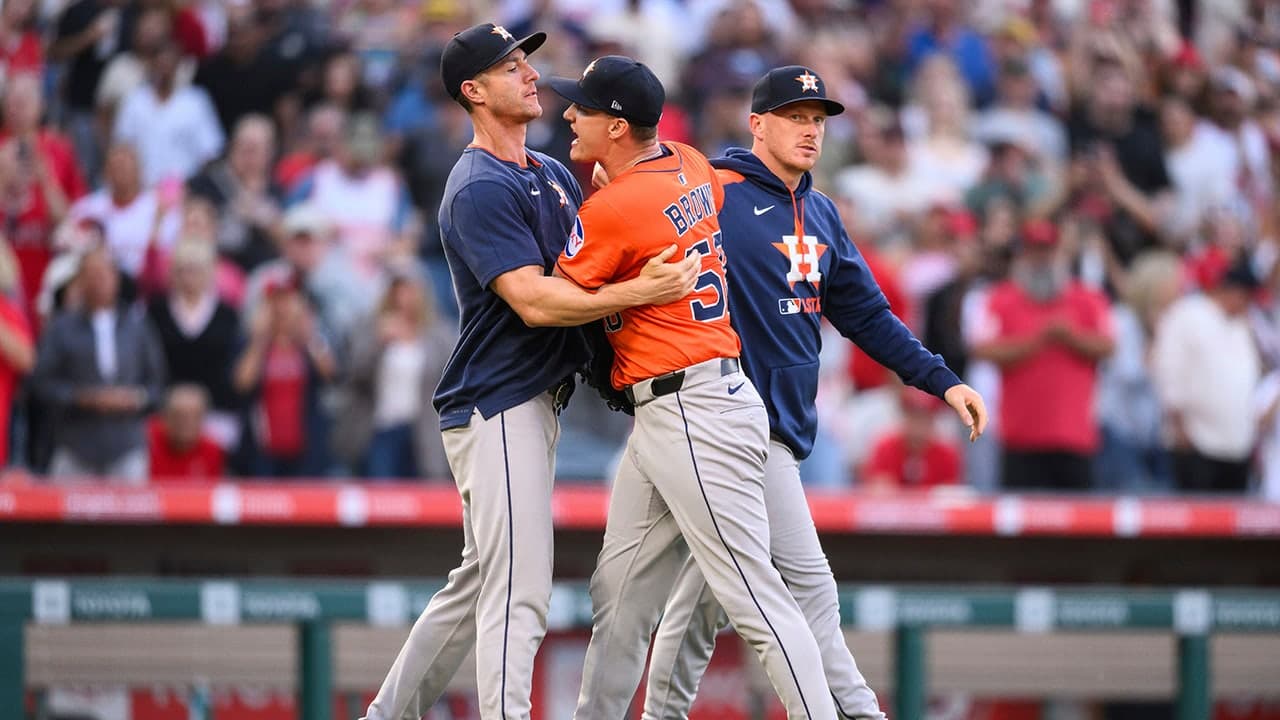 Image for Astros pitcher confronts Angels shortstop after hitting him with pitch, sparking bench-clearing scene